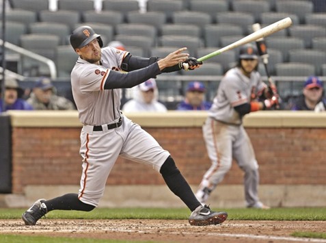 San Francisco Giants right fielder Hunter Pence (left) hits a two run home run against the New York Mets during the fourth inning at Citi Field in New York City on Sunday. (USA TODAY Sports)