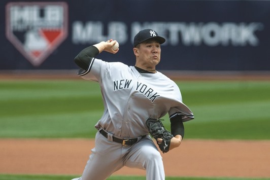 New York Yankees starting pitcher Masahiro Tanaka throws a pitch against the Oakland Athletics during the first inning. PICTURE: USA TODAY Sports