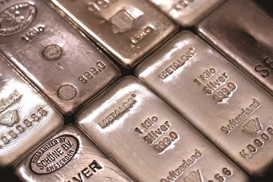 The hallmark details on one kilogram silver bars are seen at Gold Investments in London. Silver and other precious metals have benefited from mounting speculation that risks to global growth will restrain the Federal Reserveu2019s pace of interest-rate increases.