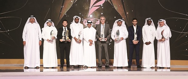 QFA president Sheikh Hamad bin Khalifa bin Ahmed al-Thani with the winners at the QFA Awards Ceremony. PICTURE: Anas Khalid