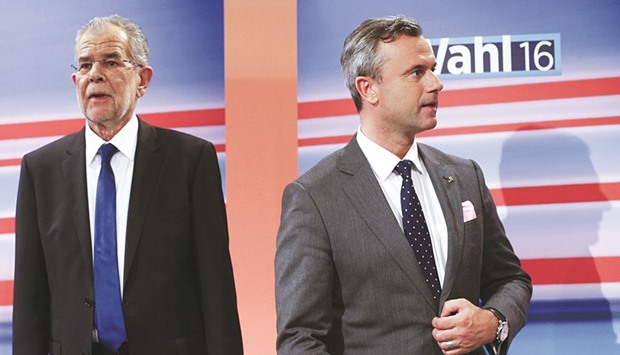 Hofer and van der Bellen (left) taking part in a TV debate in Vienna.