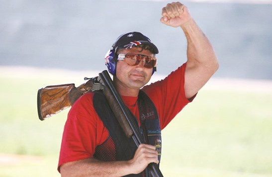 This file photo shows Australian double Olympic gold medallist Michael Diamond celebrating on his way to winning the trap event of the ISSF World Shooting Championships in Nicosia, Cyprus.