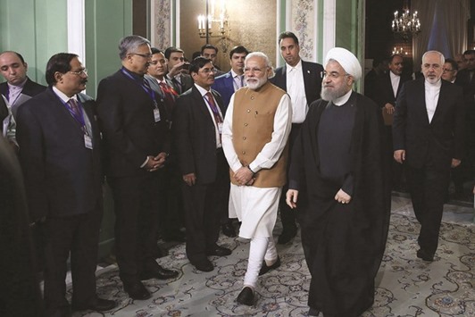 Iranu2019s President Hassan Rouhani welcomes Indiau2019s Prime Minister Narendra Modi in Tehran yesterday. They witnessed the signing of 12 memorandums of understanding, two of them on Chabahar port.