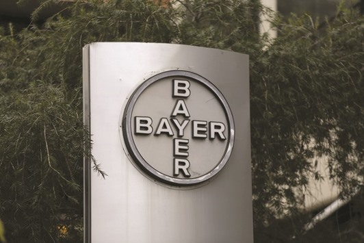 The corporate logo of Bayer is seen at the headquarters building in Caracas. The companyu2019s shares fell 5.7 % to u20ac84.42 yesterday.
