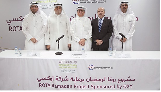 Rota and Oxy Qatar officials at the press conference.