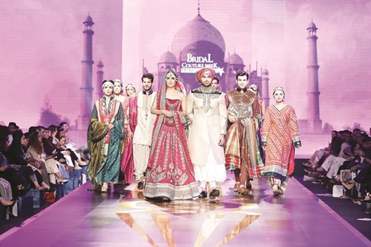 HOMAGE: Day 2 belonged to Zahid Khan from Kuki Concepts, beguiling the Taj of Agra in ensembles of Jamawar and Banarsi traditionals.     Photo by M Haris Usmani