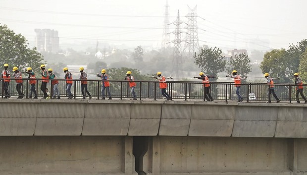 Indian metro workers pulling a wire at a construction site in New Delhi. In the 2015 fiscal year, India was allocated 20% of the $14.6bn provided by the IDA programme, leaving the other 77 recipients to divide the remaining 80%.