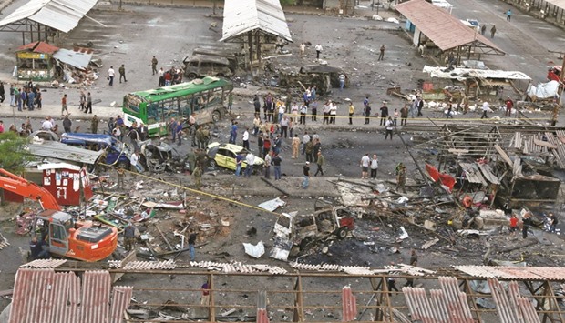 A general view shows a damaged bus station after explosions hit it in the Syrian city of Jableh yesterday.