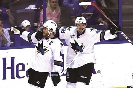 San Jose Sharks centre Joe Pavelski (left) is congratulated by centre Tomas Hertl after scoring a goal against the St. Louis Blues during the third period in game five of the Western Conference Final of the 2016 Stanley Cup Playoffs at Scottrade Centre. The Sharks won the game 6-3. PICTURE: USA TODAY Sports