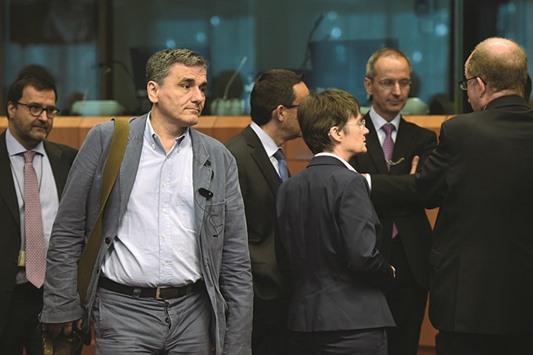 Greeceu2019s finance Minister Euclid Tsakalotos arrives at a eurozone finance ministers meeting in Brussels yesterday. With the countryu2019s debt-to-GDP almost 70% larger than it was in 2008, the International Monetary Fund is insisting that more restructuring is required to make the nationu2019s finances sustainable.