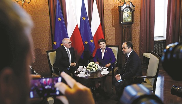 Szydlo with Frans Timmermans (left) at the Prime Ministeru2019s Chancellery in Warsaw.
