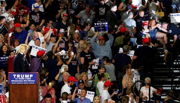 Trump watches as police remove protester in Albuquerque