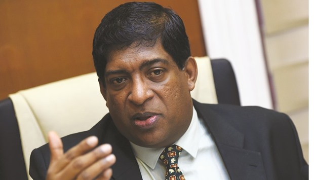 Finance Minister Ravi Karunanayake gesturing as he addressed foreign correspondents in Colombo yesterday.