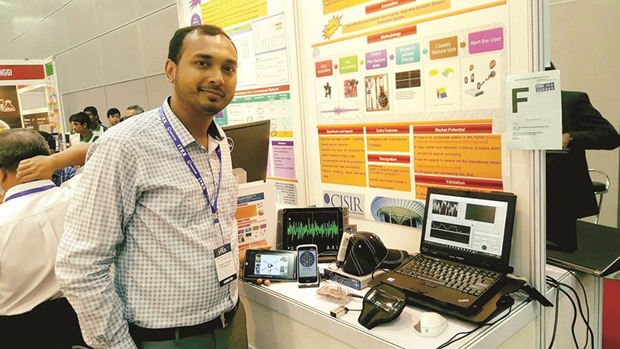 GOLD STANDARD: Mohamed Shakir shows the gadget he created, at ITEX 2016.
