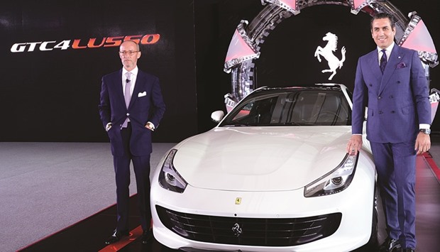 Zauner and Dagher pose with the Ferrari GTC4Lusso during the launch event yesterday. PICTURE: Thajudheen