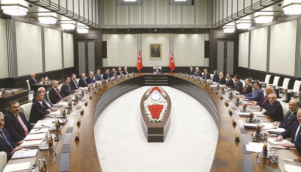 Erdogan (centre) chairing the first cabinet meeting of the new government at the Presidential Palace in Ankara.