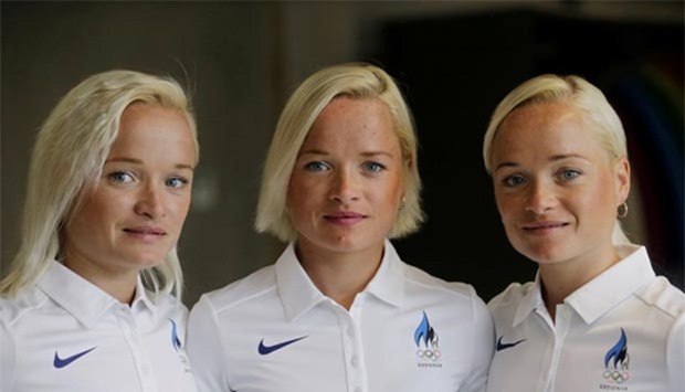Estonia's Olympic team female marathon runners triplets (left to right) Leila, Liina and Lily Luik pose for a picture in Tartu, Estonia on Thursday.
