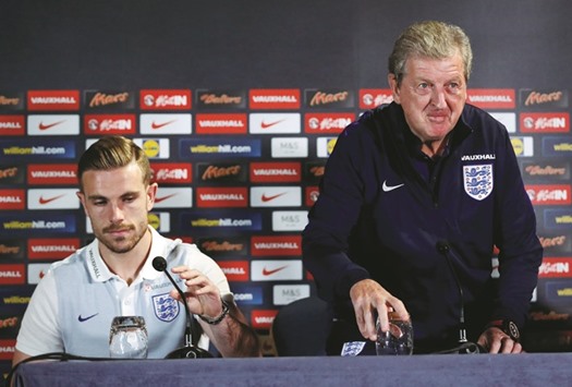England manager Roy Hodgson (R) and Jordan Henderson during a press conference yesterday. (Reuters)
