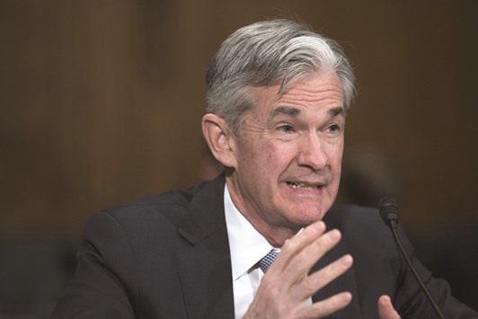 Powell says the economy remains on a u201csolid footingu201d and that he views ongoing job growth and evidence of rising wages as being more important than recent weakness in consumer spending and business investment.