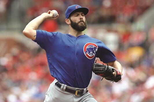 Chicago Cubs starting pitcher Jake Arrieta throws during the game against the St. Louis Cardinals on Wednesday. (USA TODAY Sports)