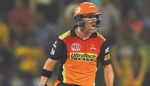 Sunrisers Hyderabad's David Warner reacts after hitting a shot during the IPL match against Gujarat Lions in New Delhi yesterday. (AFP)