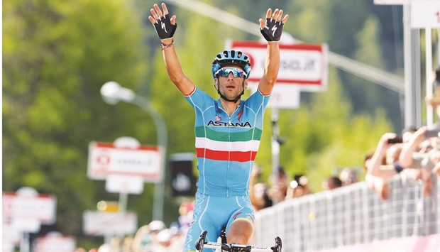 Italyu2019s Vincenzo Nibali of team Astana celebrates as he crosses the finish line to win the 19th stage of the Giro du2019Italia in Risoul, France, yesterday. (AFP)