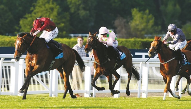 Jockey Oisin Murphy rides Pallasator to victory in the Henry II Stakes in Sandown, England, on Thursday. (Racingfotos.com)