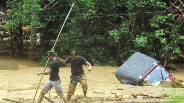 Soldiers engaging in relief and rescue efforts following a landslide in the village of Aranayake in central Sri Lanka last week.