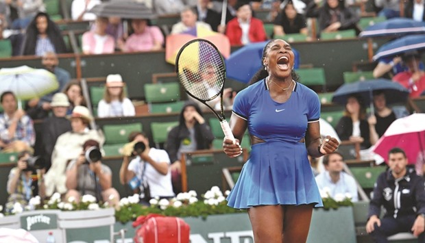 Serena Williams celebrates after winning her matcha against Franceu2019s Kristina Mladenovic in Paris. (AFP)