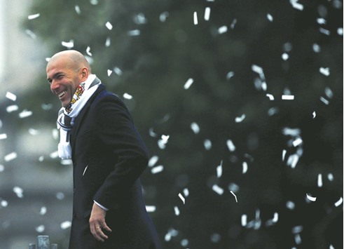 Real Madridu2019s coach Zinedine Zidane celebrates at Cibeles square.