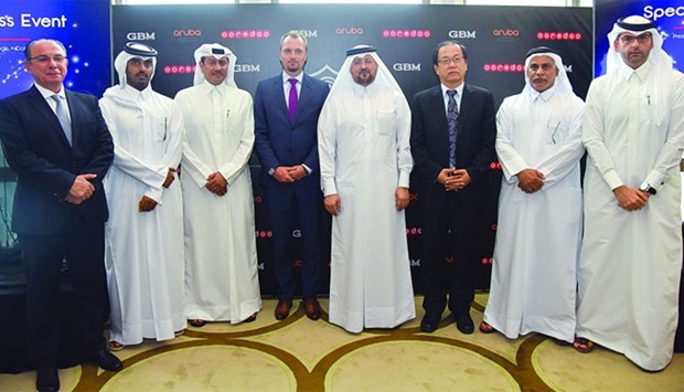 Chief executive officer Waleed al-Sayed and other Ooredoo Qatar officials flank international partners during the launch of Ooredoo's 1Gbps fibre plan. Picture: Noushad Thekkayil.