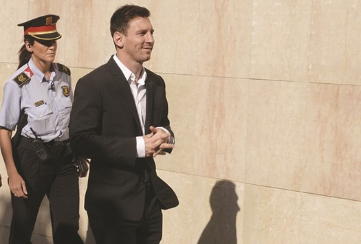 This file photo shows Barcelona football star Lionel Messi arriving to the courthouse in the coastal town of Gava near Barcelona.