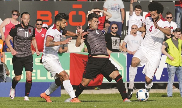 Action from the friendly match between Qatar (in white) and Albania (in black and grey) in Hartberg, Austria, yesterday. Albania won the match 3-1. Abdelkarim Hassan gave Jose Daniel Carrenou2019s side a 1-0 lead in the first minute itself, but the Albanians had Arlind Ajeti, Ermir Lenjani and Armando Sadiku to thank for their win. PICTURE: Fadi al-Assaad