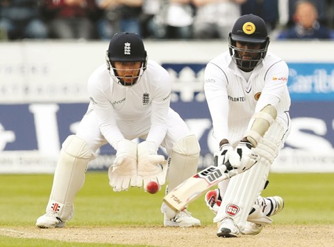 Sri Lankau2019s Angelo Mathews (right) in action against England on Day Three of the second Test in Chester-le-Street yesterday. (Reuters)