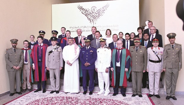 HE the Minister of State for Defence Affairs Dr Khalid bin Mohamed al-Attiyah with the faculty and the new graduates of Joaan Bin Jassim Joint Command and Staff College.