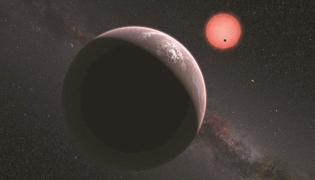 An artistu2019s impression shows an imagined view of the three planets orbiting an ultracool dwarf star 39 light-years from Earth that were discovered using a specialist telescope at ESOu2019s La Silla Observatory in Chile.