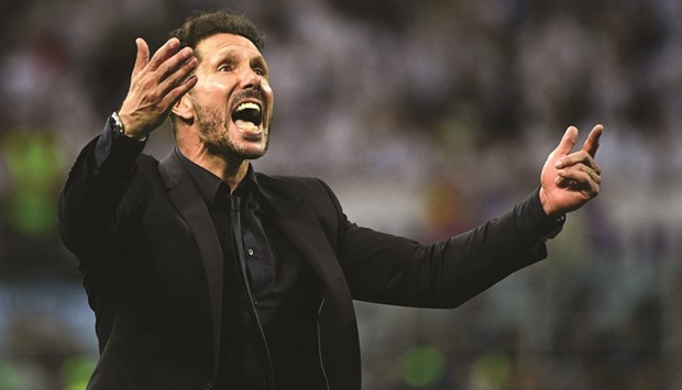Diego Simeone reacting after Real Madrid won the UEFA Champions League final football match with Atletico Madrid at San Siro Stadium in Milan on Saturday.