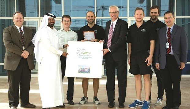 Qatar International Golf Club officials recognise Qatar Academy with Growing the Game Award.
