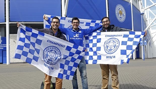 Leicester fans celebrate winning the English Premier League title
