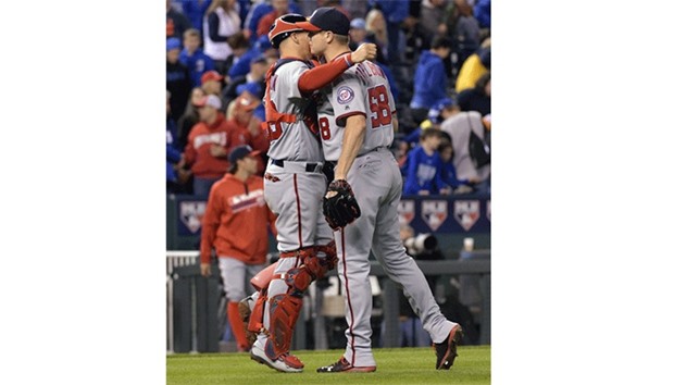 Washington Nationals relief pitcher Jonathan Papelbon (R) is congratulated by catcher Jose Lobaton after the game against the Kansas City Royals at Kauffman Stadium. PICTURE: USA TODAY Sports