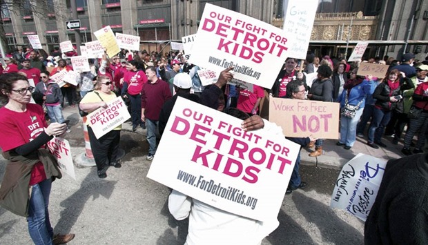 Detroit teachers stage a sick-out yesterday in front of Detroit Public Schools headquarters.