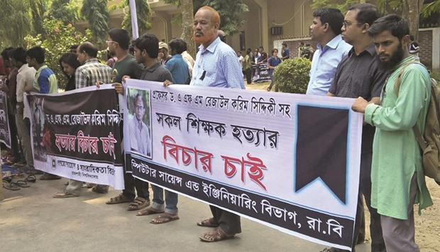 Students taking part in a protest against the killing of a university professor in Rajshahi, yesterday in Dhaka.