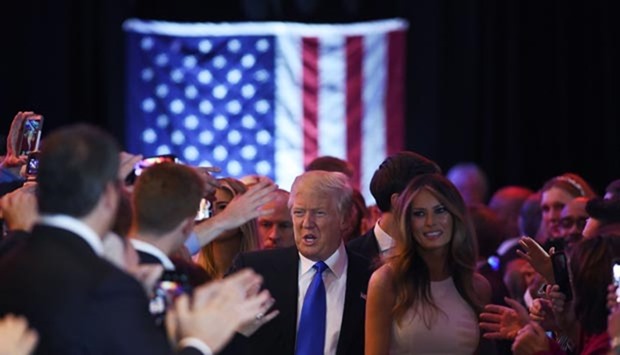 Republican Donald Trump greets his supporters as he arrives to speak in New York, following the primary in Indiana.