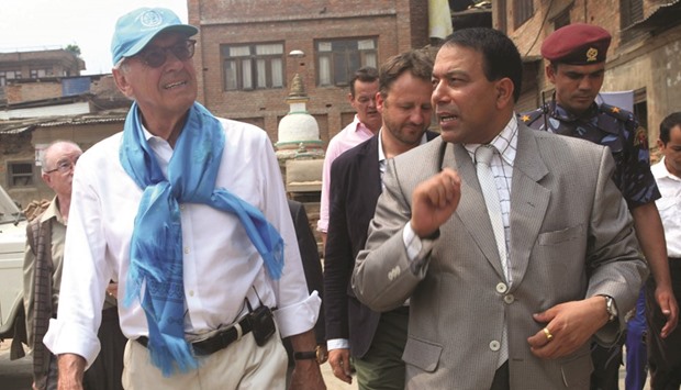 UN Deputy Secretary General Jan Eliasson (left, front) listening to Sushil Gyawali (right, front), CEO of National Reconstruction Authority of Nepal, during a visit to quake-hit Bungamati in Lalitpur yesterday. The UN official is visiting the Himalayan country in connection with the UN World Humanitarian Summit scheduled to be held in Istanbul, Turkey on May 23-24, according to Nepalu2019s foreign ministry spokesperson Tara Prasad Pokharel.