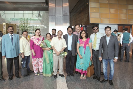 WELCOME: Anandji, centre, with the members of the ICBF Committee at the Hamad International Airport yesterday.