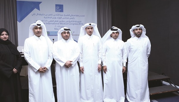 QMIC officials with representatives of strategic partners yesterday.