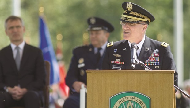 The new Supreme Allied Commander Europe (SACEUR) General Scaparrotti gives a speech at Supreme Headquarters Allied Powers Europe (SHAPE) in Mons, Belgium. In the background are his predecessor Breedlove and Nato Secretary General Stoltenberg (left).