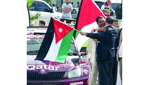 Nasser Saleh al-Attiyah greeted by Prince Feisal al-Hussein at the start of the Jordan Rally.