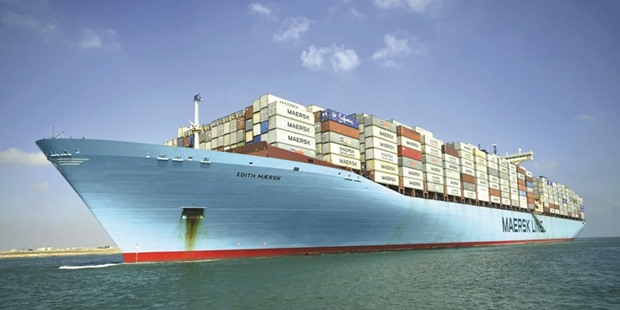 Container ship Edith Maersk crosses the Suez Canal at East Port Said Port, 120km northeast of Cairo, in this October 5, 2012 file photo. Maersk, the biggest container-shipping line, agreed in February to work with Qatargas and Royal Dutch Shell to develop LNG as a maritime fuel.