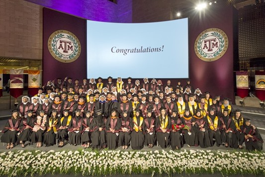 The new engineers from Tamuq with HE Dr al-Sada and Dr Kenimer yesterday after the commencement exercises.
